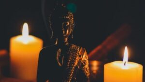 Buddha statue by candlelight